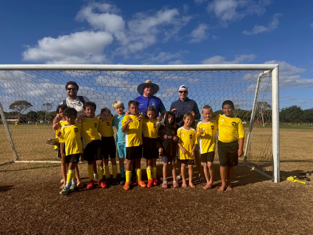 Coach Mark with the soccer community